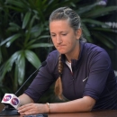 Victoria Azarenka, of Belarus, pauses during a news conference to announce that she has withdrawn from the BNP Paribas Open tennis tournament due to an ankle injury, Thursday, March 14, 2013, in Indian Wells, Calif. (AP Photo/Mark J. Terrill)