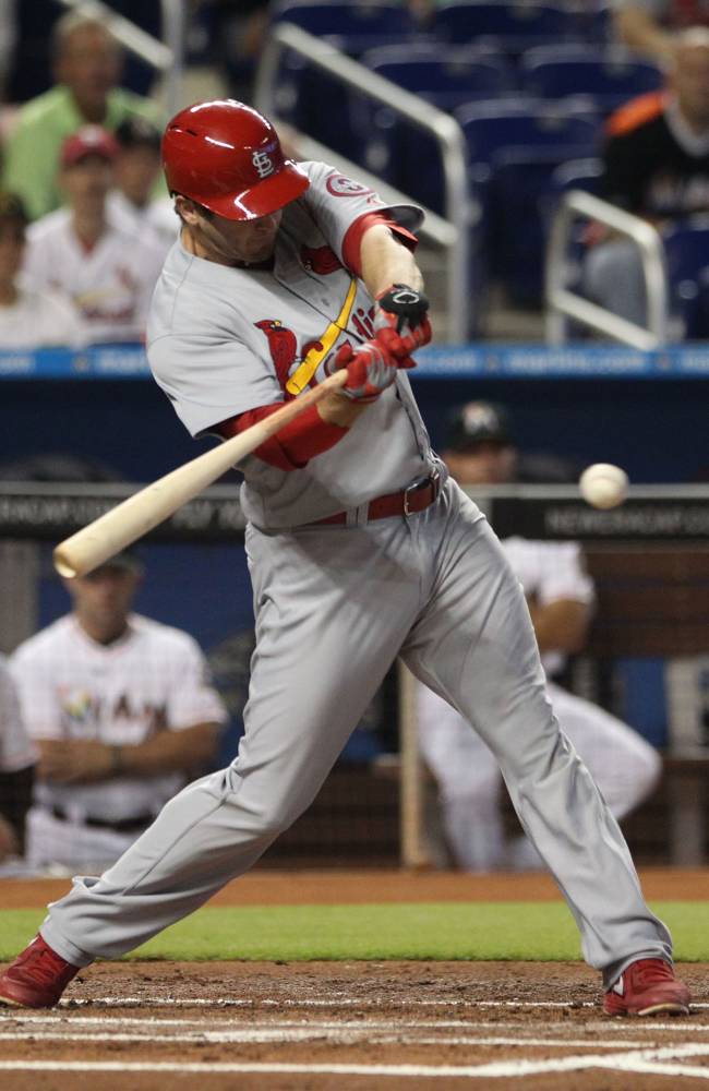 Beltran homers twice as Cards beat Marlins 13-7