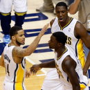 INDIANAPOLIS, IN - MAY 28:  (L-R) D.J. Augustin #14, Lance Stephenson #1 and Ian Mahinmi #28 of the Indiana Pacers celebrate in the second half after Stephenson made a 3-point basket in the seocn dhalf against the Miami Heat during Game Four of the Eastern Conference Finals of the 2013 NBA Playoffs at Bankers Life Fieldhouse on May 28, 2013 in Indianapolis, Indiana.  (Photo by Joe Robbins/Getty Images)