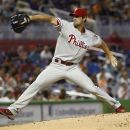 Philadelphia Phillies starter Cole Hamels pitches during the second inning of a baseball game in Miami, Sunday, Sept. 30, 2012. (AP Photo/J Pat Carter)