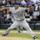 Kansas City Royals starter Jeremy Guthrie throws against the Chicago White Sox during the first inning of a baseball game in Chicago, Wednesday, Aug. 8, 2012. (AP Photo/Nam Y. Huh)