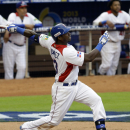 Dominican Republic's Hanley Ramirez follows through against Italy during the World Baseball Classic game in Miami, Tuesday, March 12, 2013. (AP Photo/Alan Diaz)