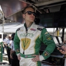 Ed Carpenter prepares to practice on the second day of qualifications for the Indianapolis 500 auto race at the Indianapolis Motor Speedway in Indianapolis, Sunday, May 19, 2013. Carpenter will start the race from the pole. (AP Photo/Darron Cummings)
