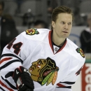 Chicago Blackhawks defenseman Kimmo Timonen (44) skates the ice during warms ups before an NHL hockey game Saturday, March 21, 2015, in Dallas. (AP Photo/LM Otero)