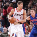 PORTLAND, OR - MARCH 16: Meyers Leonard #11 of the Portland Trail Blazers protects the ball during the game between the Detroit Pistons and the Portland Trail Blazers on March 16, 2013 at the Rose Garden Arena in Portland, Oregon. (Photo by Sam Forencich/NBAE via Getty Images)
