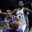 New York Knicks' J.R. Smith, left, is guarded by Memphis Grizzlies' Tony Allen (9) during the first half of an NBA basketball game in Memphis, Tenn., Friday, Nov. 16, 2012. (AP Photo/Danny Johnston)