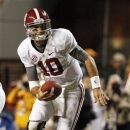 FILE - In this Oct. 20, 2012, file photo, Alabama quarterback AJ McCarron (10) runs the ball during an NCAA college football game between against Tennessee in Knoxville, Tenn. Georgia's Aaron Murray and McCarron have piloted their teams into the SEC championship game as the nation's two most efficient passers. (AP Photo/Wade Payne, File0