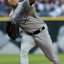 Kansas City Royals' starting pitcher Bruce Chen throws to a Chicago White Sox batter during the first inning of a baseball game, Tuesday, Aug. 7, 2012, in Chicago. (AP Photo/John Smierciak)