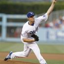 Los Angeles Dodgers starting pitcher Clayton Kershaw delivers against the St. Louis Cardinals during the first inning of a baseball game on Saturday, May 19, 2012, in Los Angeles. (AP Photo/Danny Moloshok)