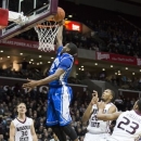 Creighton guard Jahenns Manigat (12) goes up for a layup during the first half of an NCAA college basketball game against Missouri State on Friday, Jan. 11, 2013, in Springfield, Mo. (AP Photo/David Welker)