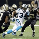 Carolina Panthers' DeAngelo Williams (34) breaks away for a 65-heard run during the first half of an NFL football game against the New Orleans Saints Sunday, Dec. 30, 2012, in New Orleans. (AP Photo/Dave Martin)
