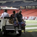 New England Patriots defensive tackle Vince Wilfork is transported out of the Georgia Dome after he was injured during the second half of an NFL football game against the Atlanta Falcons, Monday, Sept. 30, 2013, in Atlanta. The Patriots won 30-23. (AP Photo/David Goldman)