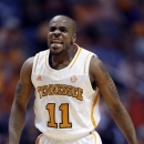 Tennessee guard Trae Golden (11) reacts to a shot in the first half of an NCAA college basketball game against Kentucky on Saturday, Feb. 16, 2013, in Knoxville, Tenn. (AP Photo/Wade Payne)