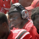 Louisville quarterback Teddy Bridgewater communicates with coaches upstairs during a 44-7 victory over Eastern Kentucky in a NCAA college football game in Louisville, Ky., Saturday, Sept. 7, 2013. (AP Photo/Garry Jones)