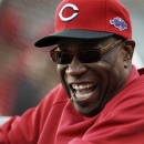 FILE - This Oct. 6, 2012 file photo shows Cincinnati Reds manager Dusty Baker laughing before Game 1 of the National League division baseball series between the San Francisco Giants and the Reds, in San Francisco. The Reds and Baker have agreed to a two-year contract extension. The Reds said a formal announcement will be made Monday afternoon, Oct. 15, 2012.The 63-year-old manager led the team to its second National League Central Division title in three seasons this year. He has been with the Reds five seasons. (AP Photo/Eric Risberg, File)