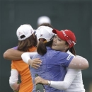 So Yeon Ryu, and Inbee Park, of South Korea hug after the final round of the U.S. Women's Open golf tournament at the Sebonack Golf Club Sunday, June 30, 2013, in Southampton, N.Y. Park has won the U.S. Women's Open to make history with titles in the year's first three majors.(AP Photo/Frank Franklin II)