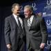 Indianapolis Colts new head coach Chuck Pagano, left, and owner Jim Irsay greet each after Pagano was introduced during a news conference at the NFL football team's headquarters in Indianapolis, Thursday, Jan. 26, 2012.