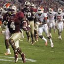 Florida State running back Chris Thompson (4) dashes to a 24-yard touchdown during the fourth quarter of an NCAA college football game against Clemson on Saturday, Sept. 22, 2012, in Tallahassee, Fla. (AP Photo/Phil Sears)