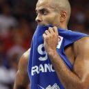 FILE - The Sept. 18, 2011 file photo shows France's Tony Parker during the EuroBasket 2011, European Basketball Championships  gold medal match against Spain in Kaunas, Lithuania. Parker sees the world differently these days. After suffering a serious eye injury in a nightclub brawl that nearly cost him a spot on France's Olympic squad, San Antonio's star point guard said the incident has given him a new perspective on life as he and his teammates prepare to face the heavily favored U.S. squad in Sunday's opener. (AP Photo/Mindaugas Kulbis, file)