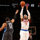 NEW YORK, NY - MARCH 20: Carmelo Anthony #7 of the New York Knicks shoots against Tobias Harris #12 of the Orlando Magic on March 20, 2013 at Madison Square Garden in New York City.  (Photo by Nathaniel S. Butler/NBAE via Getty Images)