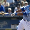 Kansas City Royals' Tony Abreu (34) hits an RBI-single during the second inning of a baseball game against the Minnesota Twins at Kauffman Stadium in Kansas City, Mo., Sunday, Sept. 2, 2012. The Royals defeated the Twins 6-4. (AP Photo/Orlin Wagner)