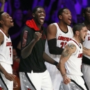 Louisville's Kevin Ware (5), Montrezl Harrell (24), Peyton Siva, right front,, Zach Price (25) and Gorgui Dieng (10) react after a basket in the second half of an NCAA college basketball game against Missouri at the Battle 4 Atlantis tournament Friday, Nov. 23, 2012 in Paradise Island, Bahamas. (AP Photo/John Bazemore)