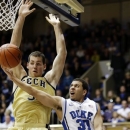 Duke's Seth Curry (30) drives around Georgia Tech's Daniel Miller during the first half of an NCAA college basketball game in Durham, N.C., Thursday, Jan. 17, 2013. (AP Photo/Gerry Broome)