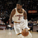 CLEVELAND, OH - MARCH 8:  Kyrie Irving #2 of the Cleveland Cavaliers drives to the hoop against the Memphis Grizzlies at The Quicken Loans Arena on March 8, 2013 in Cleveland, Ohio. (Photo by David Liam Kyle/NBAE via Getty Images)