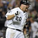 Chicago White Sox's Kevin Youkilis reacts as he runs up the first base line after hitting a game-winning RBI single, scoring Alejandro De Aza, during the tenth inning of a baseball game against the Texas Rangers, Wednesday, July 4, 2012, in Chicago. The White Sox won 5-4 in 10 innings. (AP Photo/Brian Kersey)