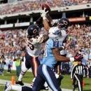Chicago Bears defenders Charles Tillman (33) and Chris Conte (47) break up a pass in the end zone intended for Tennessee Titans wide receiver Kenny Britt (18) in the second quarter of an NFL football game on Sunday, Nov. 4, 2012, in Nashville, Tenn. (AP Photo/Joe Howell)