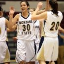 Montana State's Nubia Garcia (30) celebrates with teammates Montana State defeated Northern Arizona 74-64 in an NCAA college basketball game in the Big Sky women's tournament in Missoula, Mont., on Thursday, March 12, 2009. (AP Photo/Mike Albans)