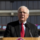 FILE - University of Alabama Athletic Director Mal Moore addresses students and fans at Bryant Denny Stadium in Tuscaloosa, Ala., in this Jan. 21, 2012 file photo. Moore been athletic director since 1999, hiring Saban from the Miami Dolphins in his best career move. The football and athletic administration building is named after him.  (AP Photo/Dave Martin, File)