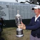 Webb Simpson poses with the U.S. Open Championship Trophy following 2012 U.S. Open golf tournament on the Lake Course at the Olympic Club in San Francisco, California June 17, 2012. REUTERS/Danny Moloshok