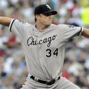 Chicago White Sox pitcher Gavin Floyd throws against the Minnesota Twins in the first inning of a baseball game, Tuesday, June 26, 2012, in Minneapolis. (AP Photo/Jim Mone)