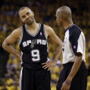 San Antonio Spurs point guard Tony Parker (9) reacts to a call from referee Zach Zarba (33) in the second quarter against the Golden State Warriors in Game 6 of a Western Conference semifinal NBA basketball playoff series in Oakland, Calif., Thursday, May 16, 2013. (AP Photo/Jeff Chiu)