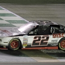 Brad Keselowski crosses the start-finish line a few laps before the NASCAR Nationwide Series auto race was stopped due to rain, at Kentucky Speedway in Sparta, Ky., Friday, June 28, 2013. Keselowski won the race. (AP Photo/Garry Jones)