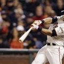 San Francisco Giants' Angel Pagan singles against the Colorado Rockies during the fifth inning of a baseball game on Monday, Sept. 17, 2012, in San Francisco. (AP Photo/Marcio Jose Sanchez)