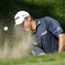 Lee Westwood, of England, hits out of the bunker on the ninth green during the final round of the BMW Championship PGA golf tournament at Crooked Stick Golf Club in Carmel, Ind., Sunday, Sept. 9, 2012. (AP Photo/Charles Rex Arbogast)