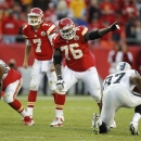 FILE - In this Oct. 28, 2012 file photo, Kansas City Chiefs tackle Branden Albert (76) gestures during an NFL football game in Kansas City, Mo. Albert has signed his franchise tender. The Chiefs announced that Albert signed his deal on Thursday, March 21, 2013, two weeks after placing the franchise tag on him. Albert will make $9.828 million if he plays under the one-year contract. (AP Photo/Ed Zurga, File)