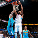 OKLAHOMA CITY, OK - DECEMBER 12: Kevin Durant #35 of the Oklahoma City Thunder dunks against Jason Smith #14 of the New Orleans Hornets on December 12, 2012 at the Chesapeake Energy Arena in Oklahoma City, Oklahoma. (Photo by Layne Murdoch/NBAE via Getty Images)