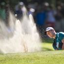 German's Martin Kaymer plays a shot out of the bunker of the 14th hole of the Dutch Open Golf Tournament in Hilversum September 9, 2012. REUTERS/Paul Vreeker/United Photos