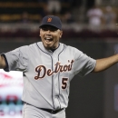 Detroit Tigers pitcher Joaquin Benoit celebrates after striking out Minnesota Twins' Josh Willingham to end the baseball game, Wednesday, Sept. 25, 2013, in Minneapolis, where the Tigers won 1-0, clinching the AL Central title. (AP Photo/Jim Mone)