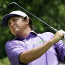 Jason Dufner watches his tee shot on the second hole during the third round of the PGA Colonial golf tournament, Saturday, May 26, 2012, in Fort Worth, Texas. (AP Photo/LM Otero)