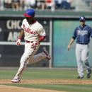 Philadelphia Phillies' Jimmy Rollins runs the bases after he hit a two run home run against the Tampa Bay Rays in the third inning of an interleague baseball game Saturday, June 23, 2012, in Philadelphia. (AP Photo/H. Rumph Jr)