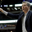 Northwestern head coach Bill Carmody reacts during the second half of an NCAA college basketball game at the Big Ten tournament against Iowa Thursday, March 14, 2013, in Chicago. (AP Photo/Charles Rex Arbogast)