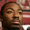 FILE - In this Wednesday, Dec. 12, 2012 file photo, South Carolina's Marcus Lattimore listens to a reporter's question during an NCAA college football news conference, in Columbia, S.C., after Lattimore announced he was giving up his final season of college football to enter the NFL draft. The former South Carolina star tailback has spent the past two months in Pensacola, Fla., rehabbing his right knee which he shredded on Oct. 27 against Tennessee. Lattimore sustained a dislocation and tore several ligaments in the gruesome injury. Lattimore is confident he'll be ready to play NFL football this fall. (AP Photo/Mary Ann Chastain, File)