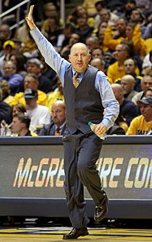 Marquette coach Buzz Williams, signaling to his team in the second half, did a postgame dance that did not thrill West Virginia fans.