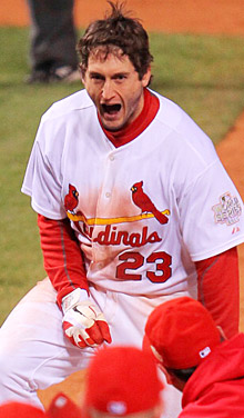 David Freese celebrates his walk-off solo home run in the 11th inning.
