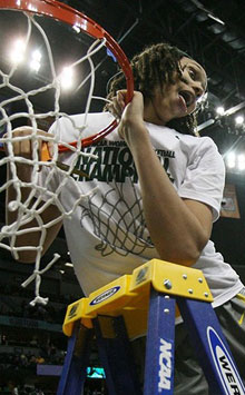 Baylor Bears center Brittney Griner cuts the net after winning the national championship.