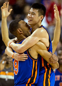 Knicks guard Jeremy Lin (R) celebrates with teammate Jared Jeffries after his game-winning three-pointer.
